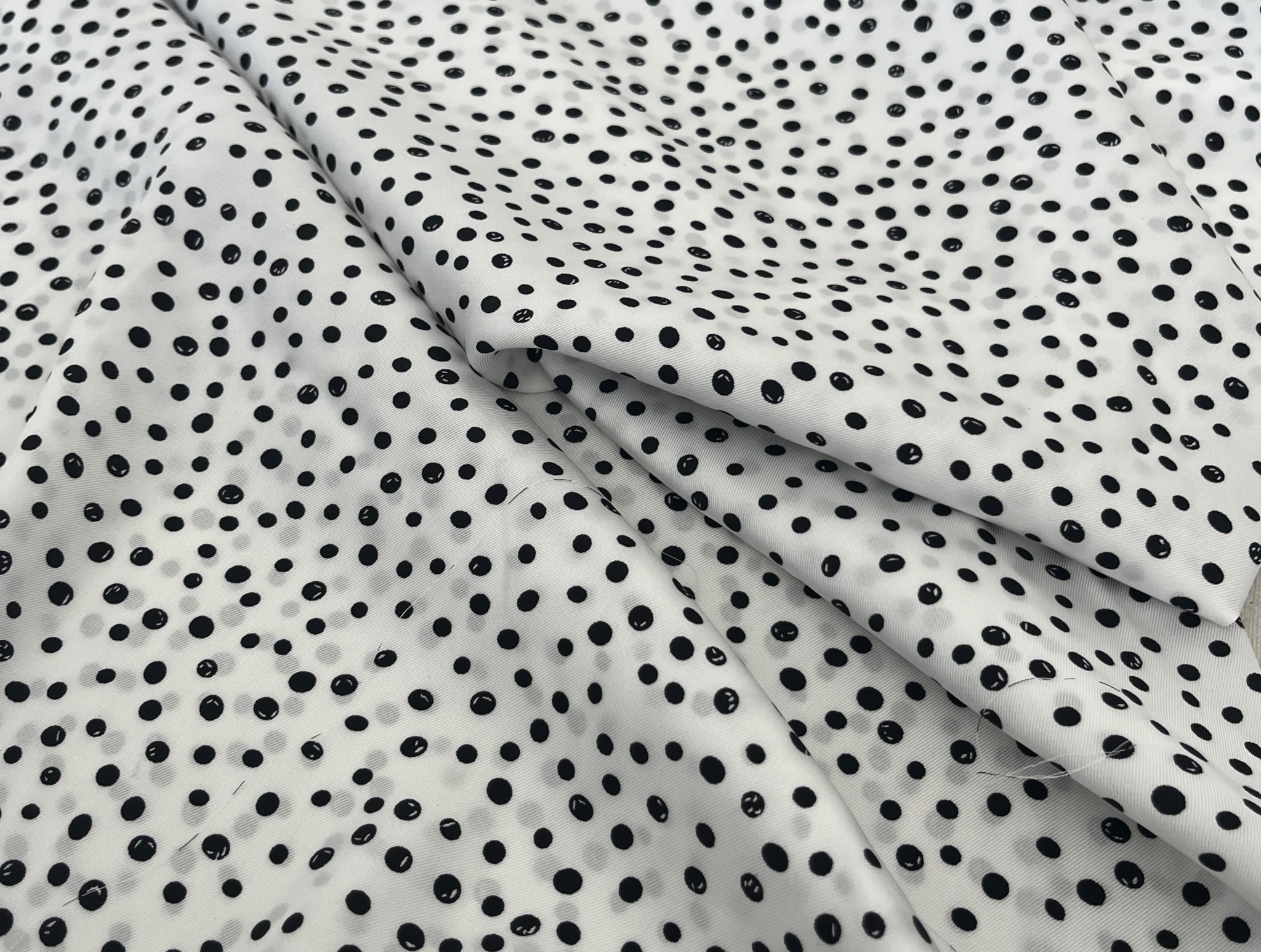 PRINTED SATIN FABRIC WITH BLACK POLKA DOTS